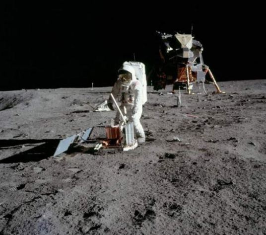 Buzz Aldrin, setting up a seismic detector in 1969. The solar systems's first luno-phone.